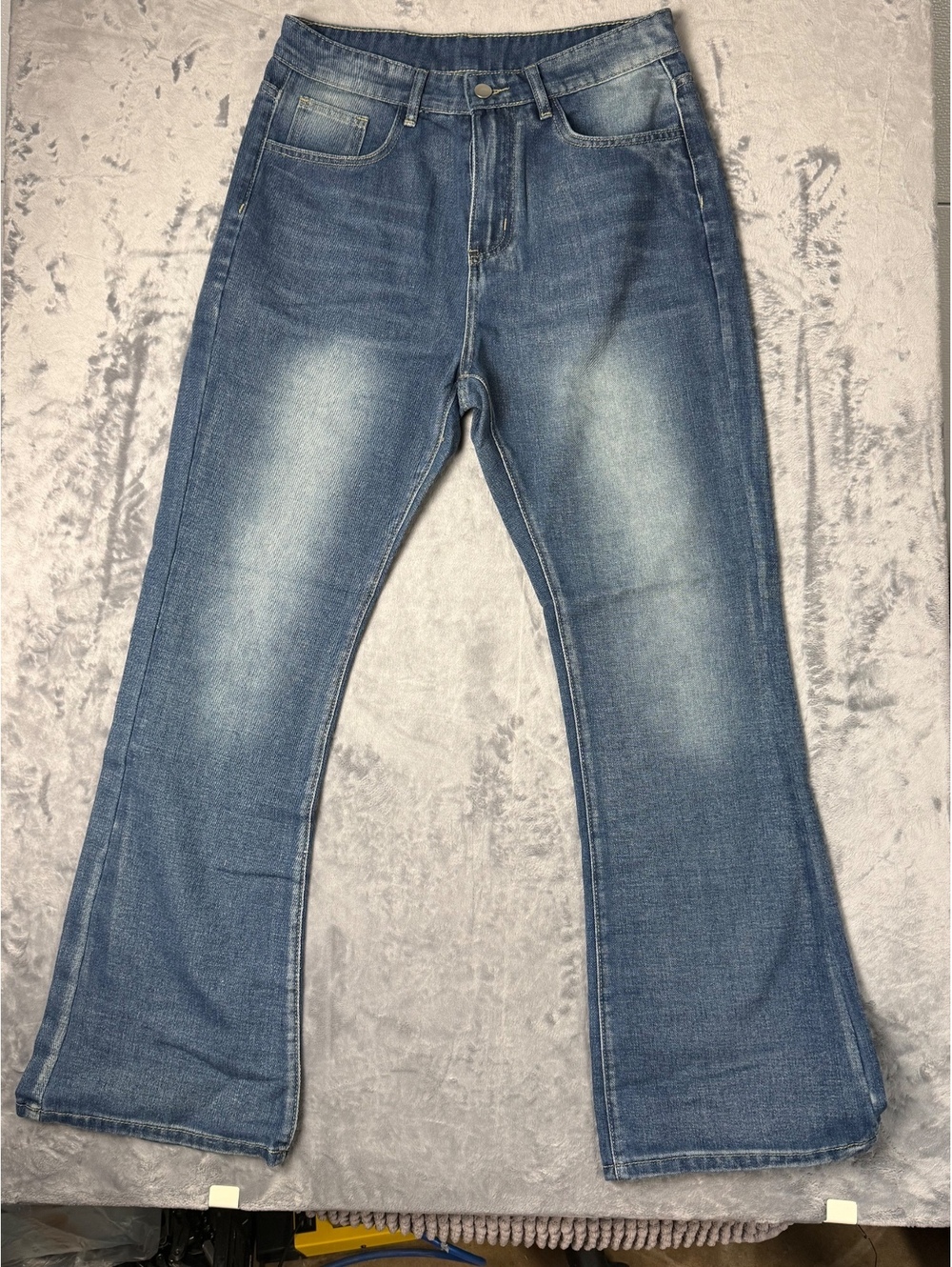 Women's Light Blue Flared Jeans with Distressed Wash